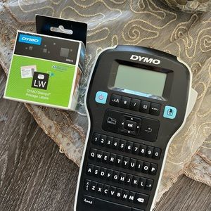 Dymo Label Maker With An Extra Label Tape Cassette
